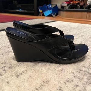 Womens Chicklet faux leather open back black wedge sandal.